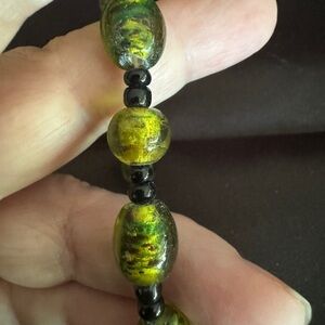 Murano Glass green bead bracelet gold spun with black beads